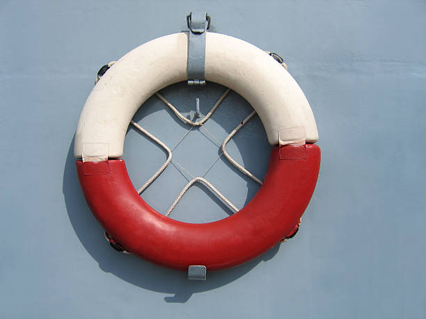 old rettungsring zu - sinking life belt head above water life stock-fotos und bilder