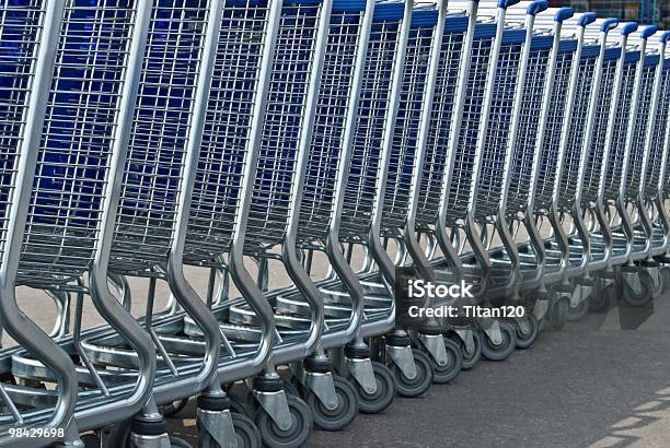 Row Of Light Carts For A Supermarket Stock Photo - Download Image Now - Abstract, Backgrounds, Business