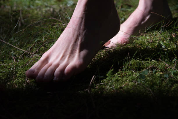 istock feet on the nature 984297790