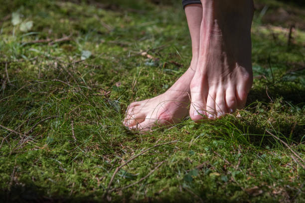 istock feet on the nature 984298568