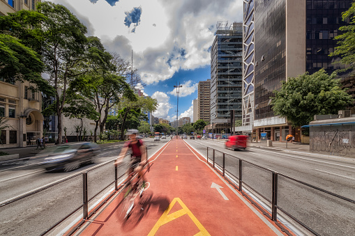 Paulista Avenue photographed with view of the bike path, Sao Paulo, Brazil.