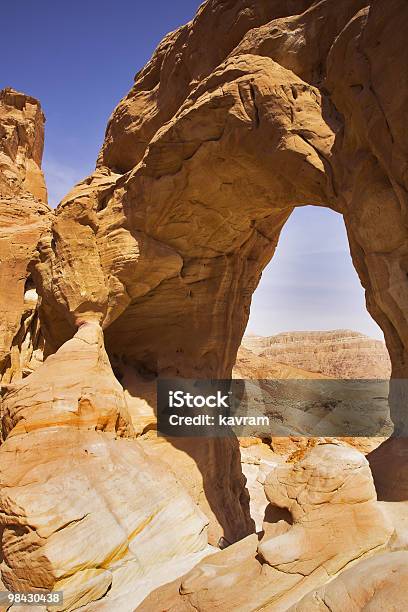 Erosive Arch In Hills From Red Sandstone Stock Photo - Download Image Now - Arid Climate, Arranging, Blue