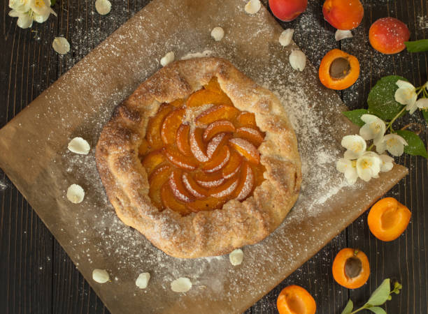 istock Biscuit with apricots on dark wooden table 984306948
