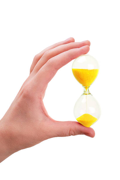 istock The female hand holds a sand-glass 98431289