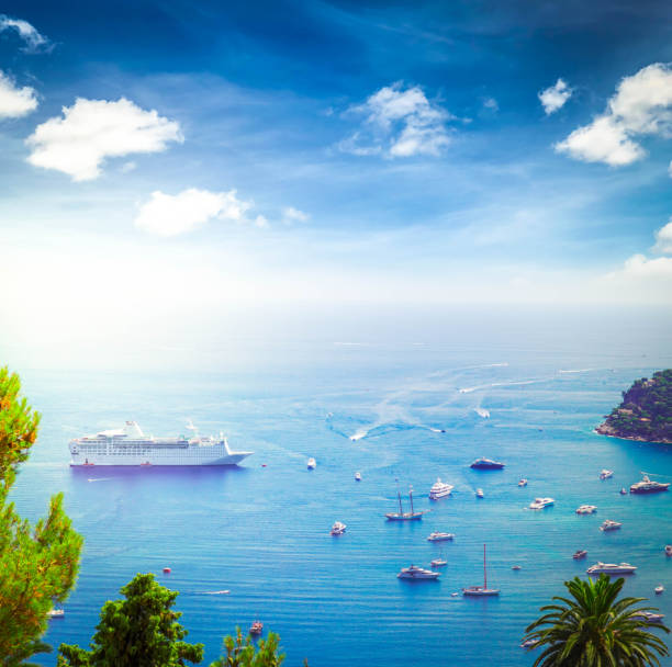 colorful coast and blue water with boats and ships, cote dAzur Provence, France, retro toned
