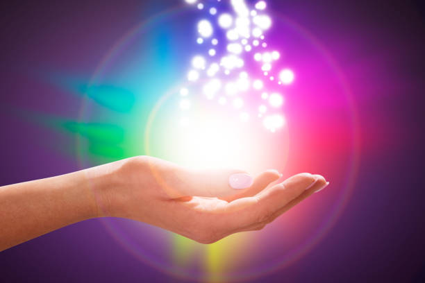 istock Person's Hand Into Magical Healing Energy Field 984323880