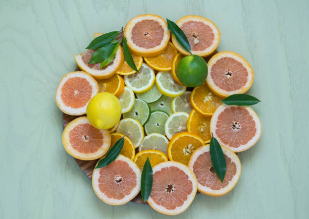 istock Slices of various Citrus Fruit - closeup 984344302