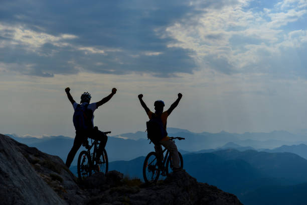 istock ride bicycles and reach high mountains 984347570