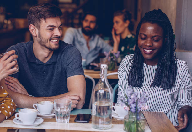 istock Friends sitting at coffee shop 984352610