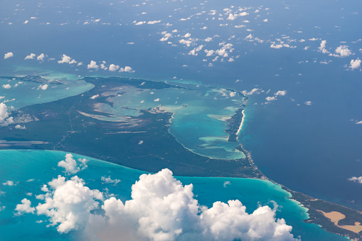 Beautiful aerial view of the Bahamas islands - Spanish Wells - turquoise seas and interesting clouds.
