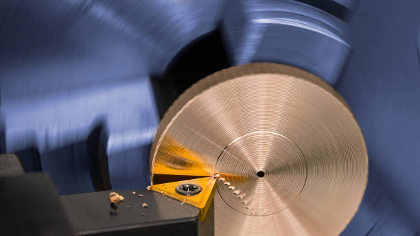 istock Detail of a tool bit when turning on a lathe. Machining, motion blur 984370956