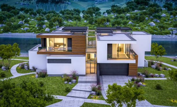 istock 3d rendering of modern cozy house by the river at evening 984373382