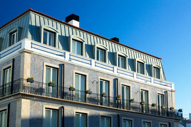 Lisbon, Portugal - February 08, 2018: Sunny morning in Lisbon. Facade of the renovated tenement house. Alfama district.