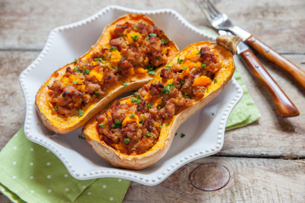 istock Pumpkin stuffed with meat, vegetables and herbs 984413036