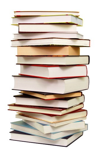 High stack of books isolated on white background