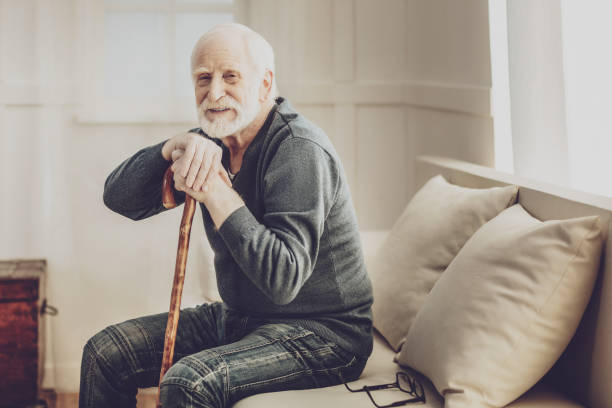 istock Positive aged man resting at home 984414504