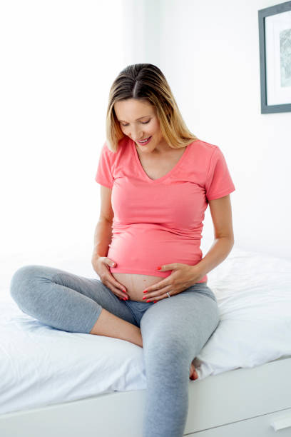 istock Young woman enjoying in pregnancy 984415098
