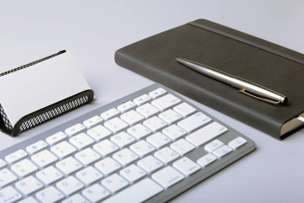 istock Corporate business desktop with laptop, digital tablet, accessories and work equipment. selective focus. 984440778