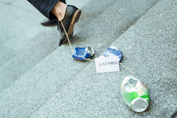 istock Man wearing suit and leather shoes leaving office forever 984449410