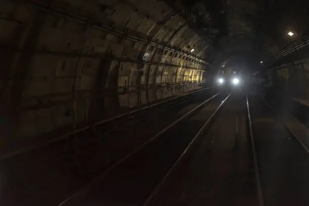 Subway, underground, crossing in the tunnel, with front lighting