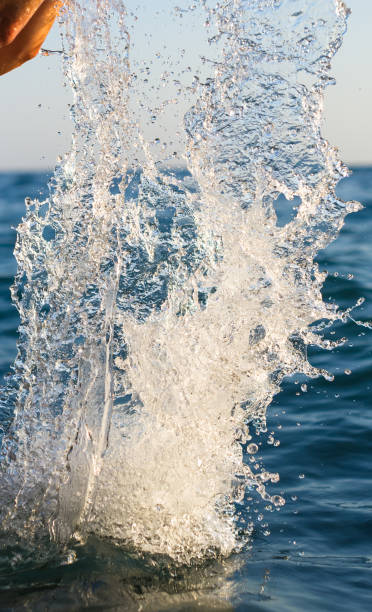 istock large transparent splashes sea water on a Sunny day 984472184