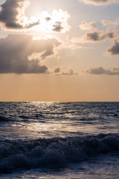 istock Amazing sea sunset, the sun, waves, clouds 984492048