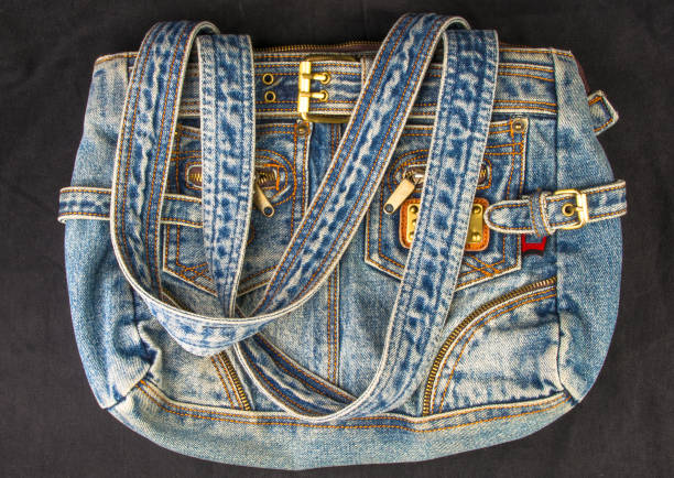 istock fittings on the jeans hand bag 984499510