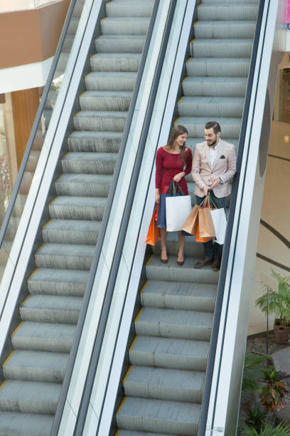 istock Couple with shopping bags 984507736