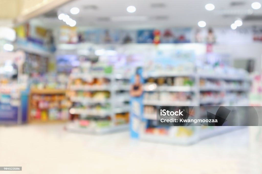 Pharmacy drugstore blur abstract backbround with medicine and healthcare product on shelves Pharmacy Stock Photo