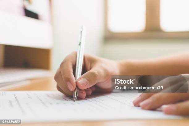 Businessman Hand Signing The Document Business Contract Agreement Stock Photo - Download Image Now