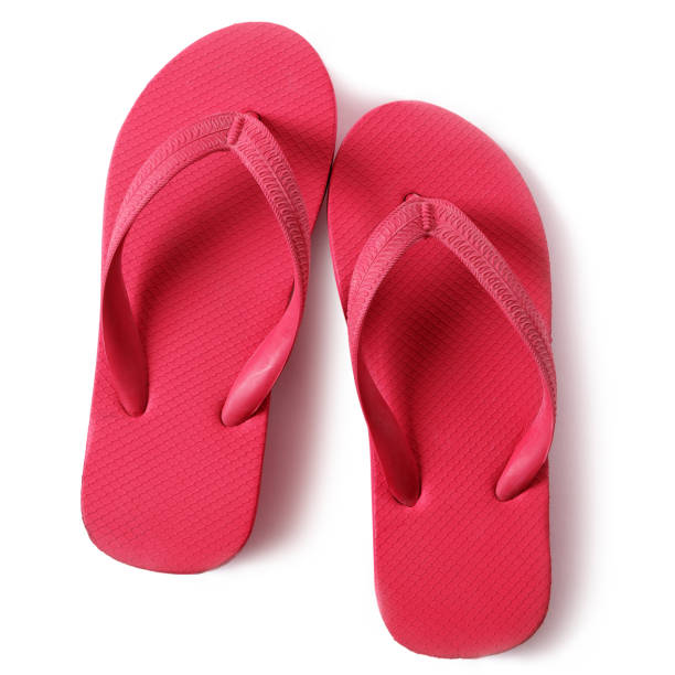 istock Red flipflops beach sandals isolated on white background 984572552