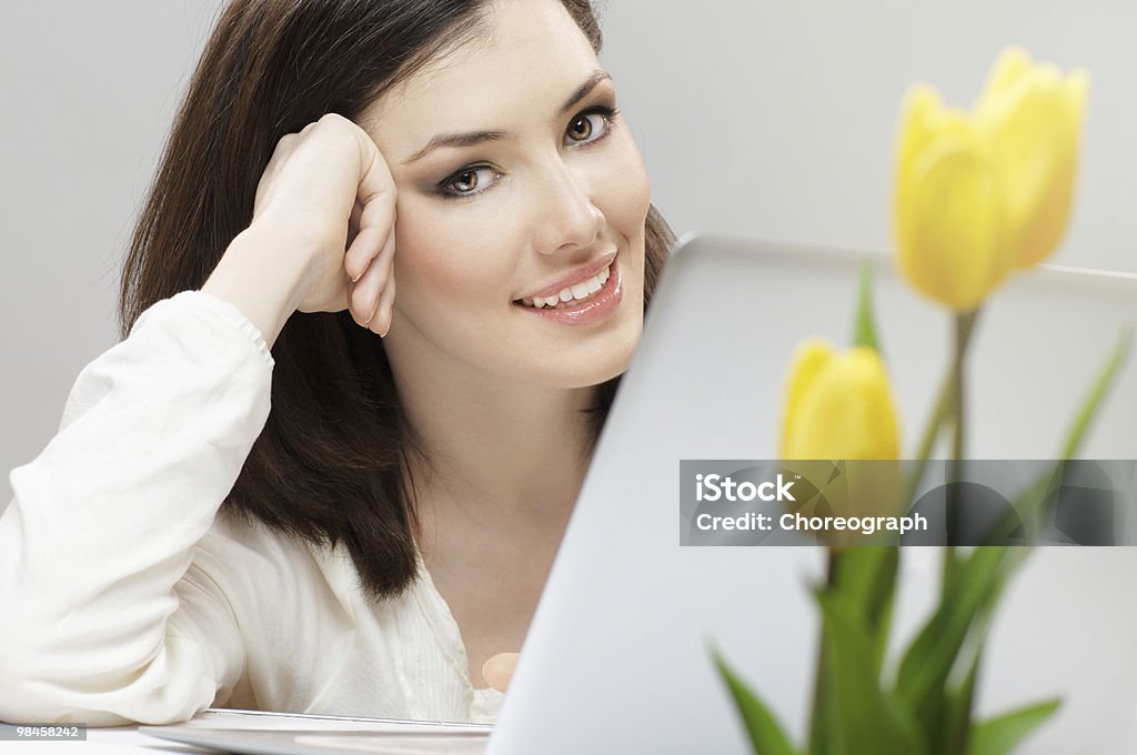 working in a laptop  Adult Stock Photo