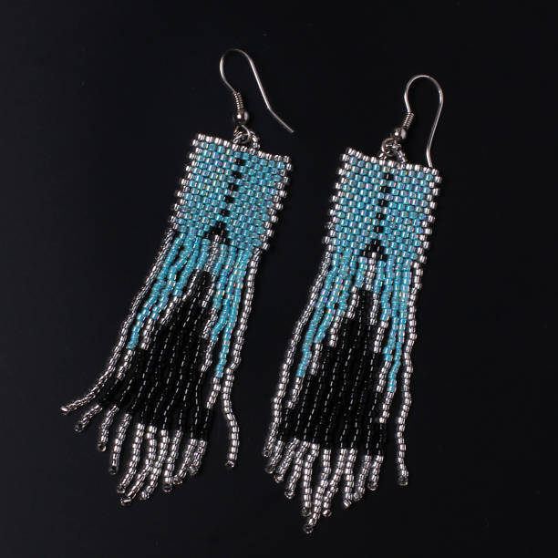 istock Handmade jewelry. Earrings from beads. 984591918