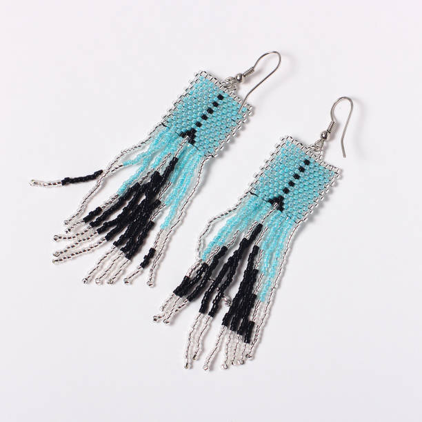 istock Handmade jewelry. Earrings from beads. 984592194