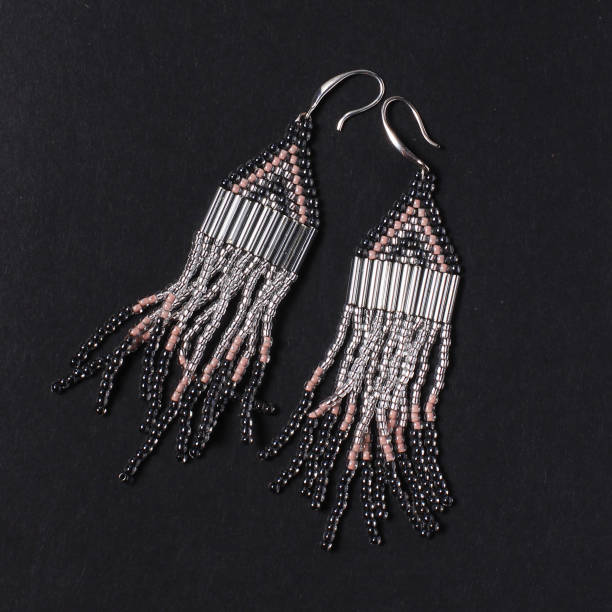istock Handmade jewelry. Earrings from beads. 984592470
