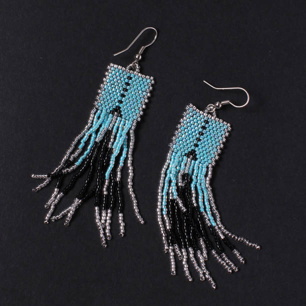 istock Handmade jewelry. Earrings from beads. 984592476