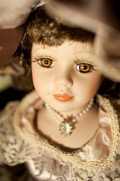 istock Vertical Portrait Of A Pottery Doll 98459479