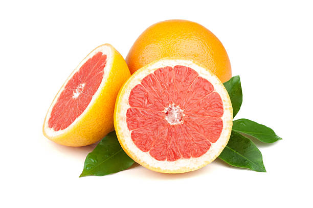 istock Fresh and juicy grapefruits on a white background 98459785