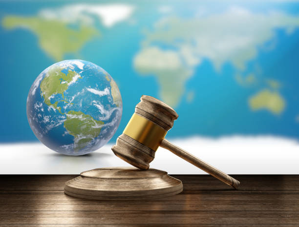 world map planet earth globe and wooden judge gavel 3d-illustration. Elements of this image furnished by NASA world map planet earth globe and wooden judge gavel 3d-illustration. Elements of this image furnished by NASA paragraph photos stock pictures, royalty-free photos & images