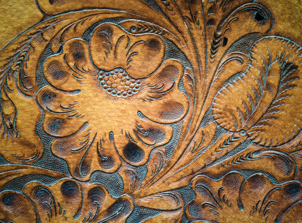 istock Brown leatherwork carved detail on saddle. 984625978