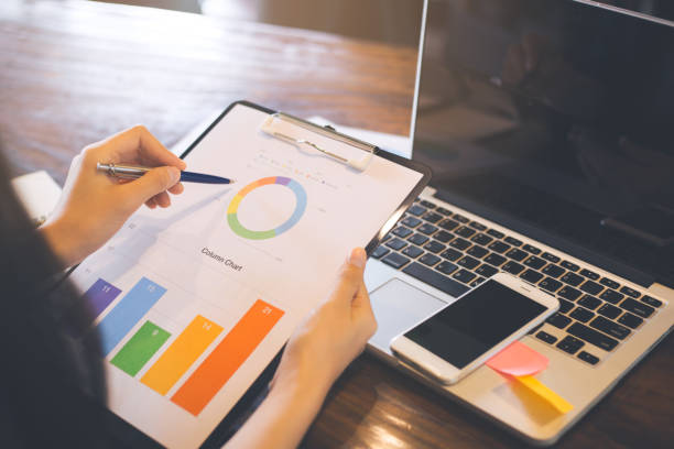 istock Businessman analyzing working discussing the charts and graphs showing the results. 984630372