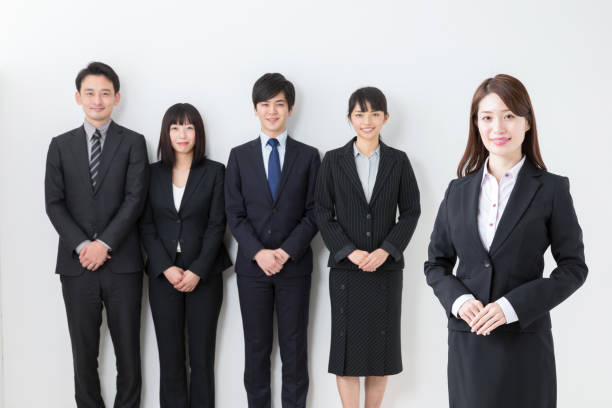 istock portrait of asian business group on white background 984632840