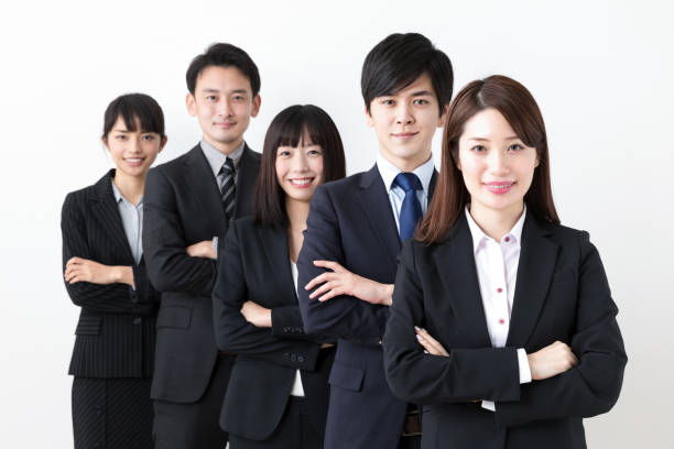 istock portrait of asian business group on white background 984632864