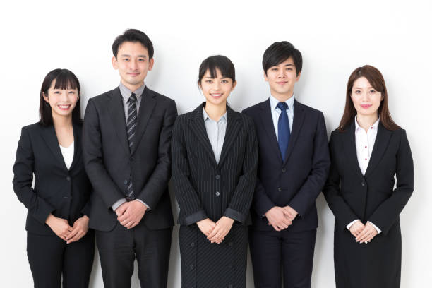 retrato de grupo de negócios asiáticos em fundo branco - people in a row in a row business office worker - fotografias e filmes do acervo