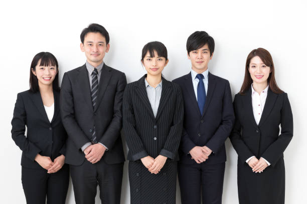 istock portrait of asian business group on white background 984632886