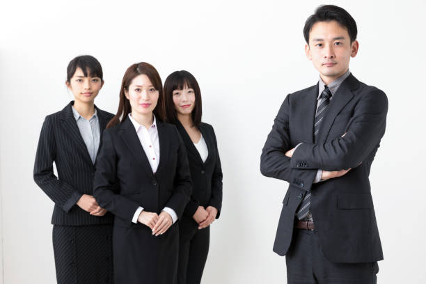 istock portrait of asian business group on white background 984632964