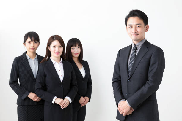 istock portrait of asian business group on white background 984632968