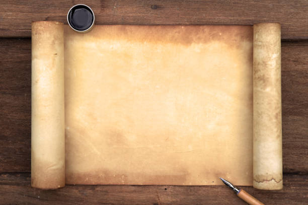 istock old paper on brown wood texture with pen and ink 984636874