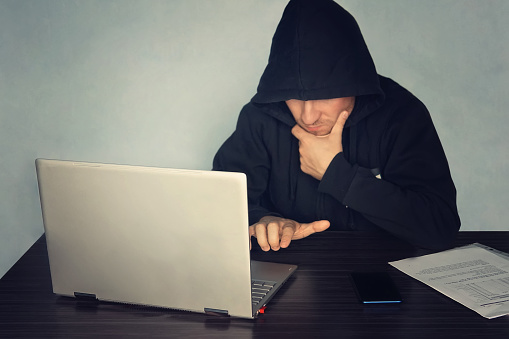 Anonymous Programmer Hack Anonymous Hacker Programmer Uses A Laptop To Hack The System Stealing ...
