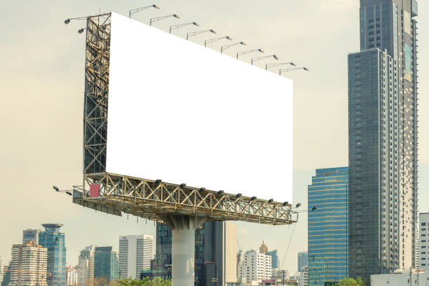 istock billboard blank on road in city for advertising background 984653088